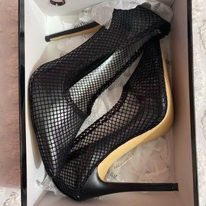 Pretty little thing fishnet heels